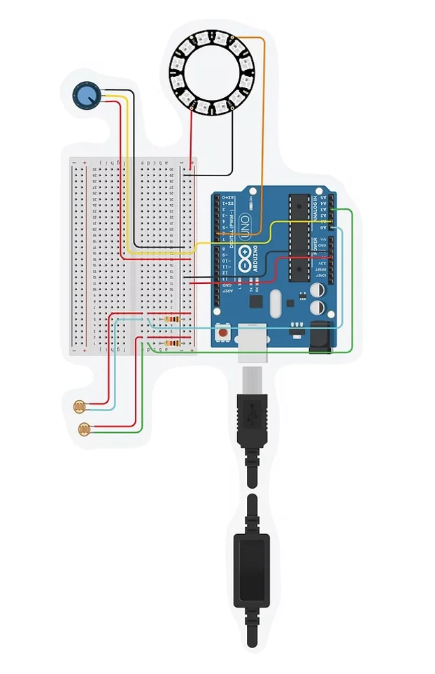 The Ilia electronics laid out: Arduino Uno, NeoPixel ring, two LDR sensors with soldered wire extensions, a potentiometer, and an external power switch, all on a breadboard during testing