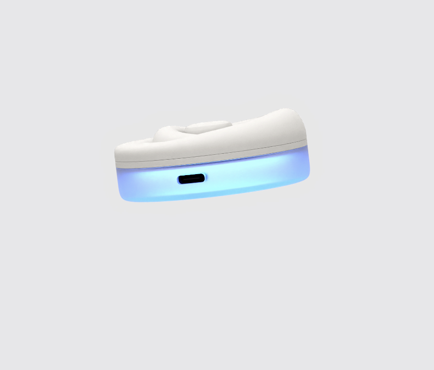 Side view of the white device showing the USB-C charging port and blue base glow